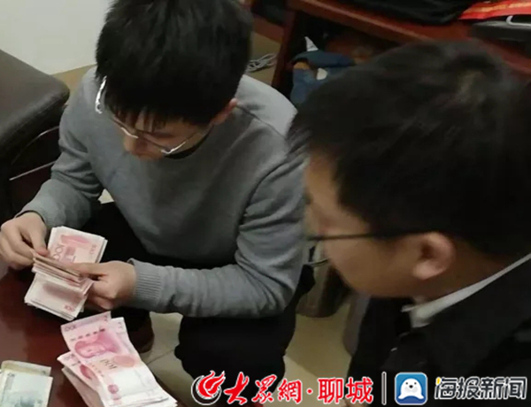 春节前夕冠县法院为21名农民工讨回工资